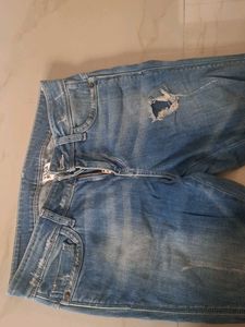 Ripped Flare Jeans