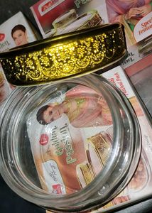 Beautiful New Glass Jar With Golden Glitter Lit.