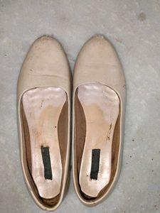 Worn Beige Ballet Flats