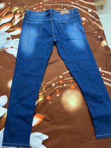 Blue Distressed Denim Jeans