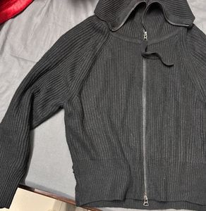 Black Knit Zip-Up Jacket with a high collar. (M/L)