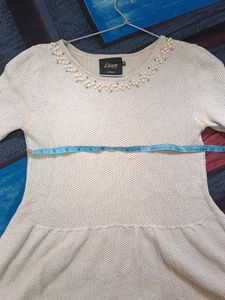 Elegant Pearl Embellished Peplum Top