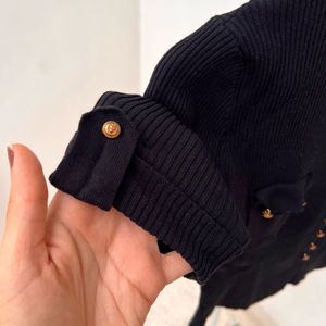 Black Ribbed Knit Top with Gold Versace Buttons