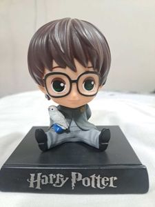 Harry Potter chibi-style figure with Hedwig