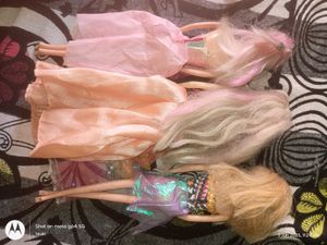 set of 3 Barbie dolls