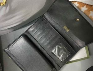 Gucci Black Clutch/ Wallet With Gold Details