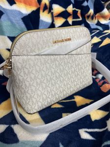MK SLING BAG