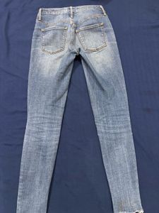 Distressed Denim Jeans