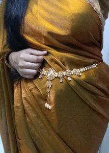 Elegant Gold Tone Saree