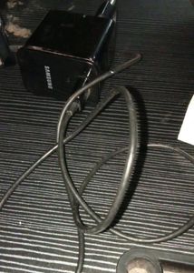 Samsung Galaxy Tablet With Blue Cover And Charger