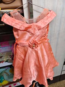 Beautiful shine frock with net shoulder cutoff