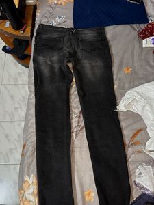 Distressed Black Denim Jeans