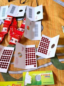 13 bindi sets and 12 kajal set