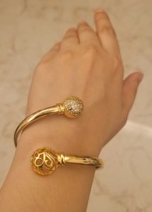 Twisting Gold Color Bangle