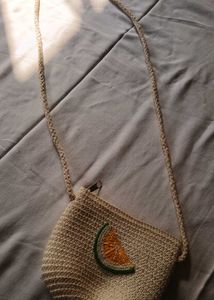 A sling purse