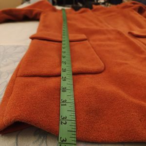 orange statement coat 🧥