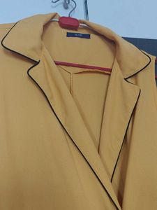 Bold in Yellow: Sleek Sleeveless Dress for Every O