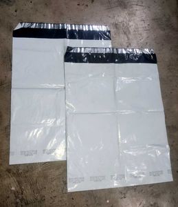 2 Shipping Bags and Twenty Labels
