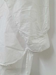 I am selling my white shirt rarely used
