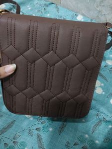 BRAND NEW SLING BAG.