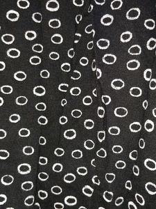 Black top with white circle print