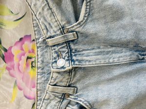 Ripped Light Wash Mom Jeans