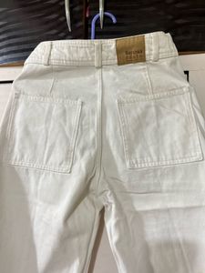 White flared jeans