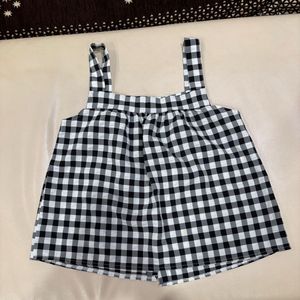 A Black and White Crop Top