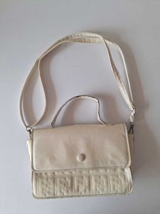 Light Pink Handbag and cream Slingbag