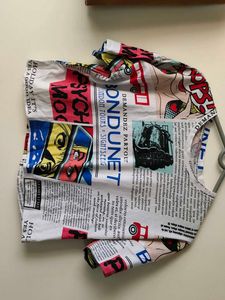 🗞️ Newspaper Print Tee – Bold, Artsy & One-of-a-K