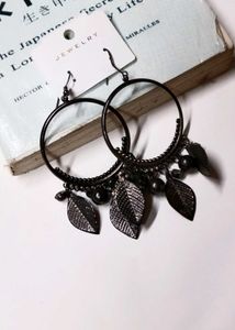 A Pair Of Black Hoop earrings
