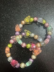 Y2k charm bracelet and Hawaii floral claw clip