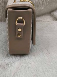 Chic Crossbody Bag with Chain Detail