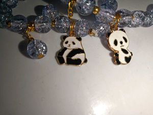 Pair Of Bracelet With Panda Charms.