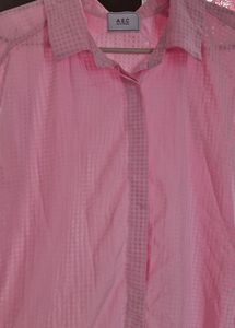 A Baby Pink Coloured Transparent Shirt.