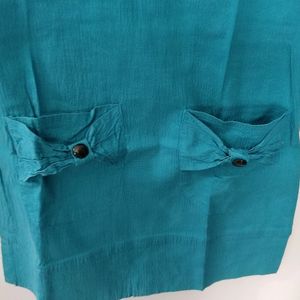 Tunic With A Bow Neck And Pockets