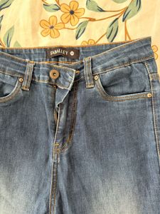 Ripped Knee Denim Jeans