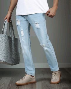 Ripped Light Wash Denim Jeans