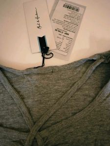 Effortless Chic: Twisted-Front Grey Top