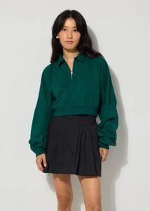 Green Cropped Pullover & Black Skirt