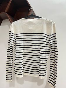 white sweater black Striped