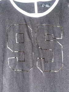 A black crop t-shirt