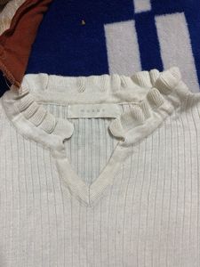Ribbed Knit Top with Ruffle Neck