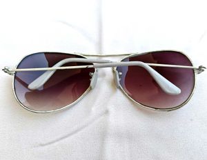 White Rimmed Sunglasses