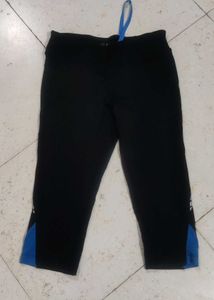 Capri active wear with elastic and drawstrings.