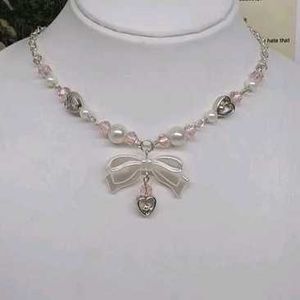 Pearl &amp; Bow Charm Necklace