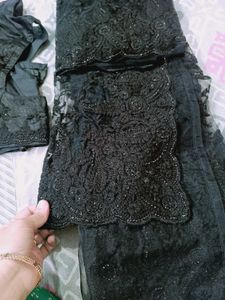 new beautiful embroidered black stone net saree.