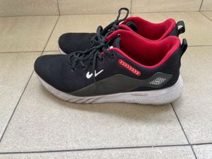 Red and Black Coloured Running Shoes