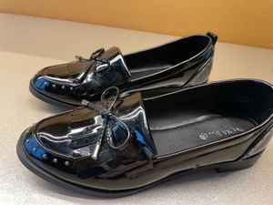 new bright shiny black westside loafers