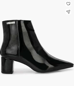 women black heeled Chelsea boots